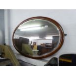 A LARGE, OVAL BEVELLED EDGE WALL MIROR, IN INLAID MAHOGANY FRAME