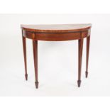 GEORGIAN INLAID AND FIGURED MAHOGANY DEMI-LUNE CARD TABLE, the crossbanded and fold-over top