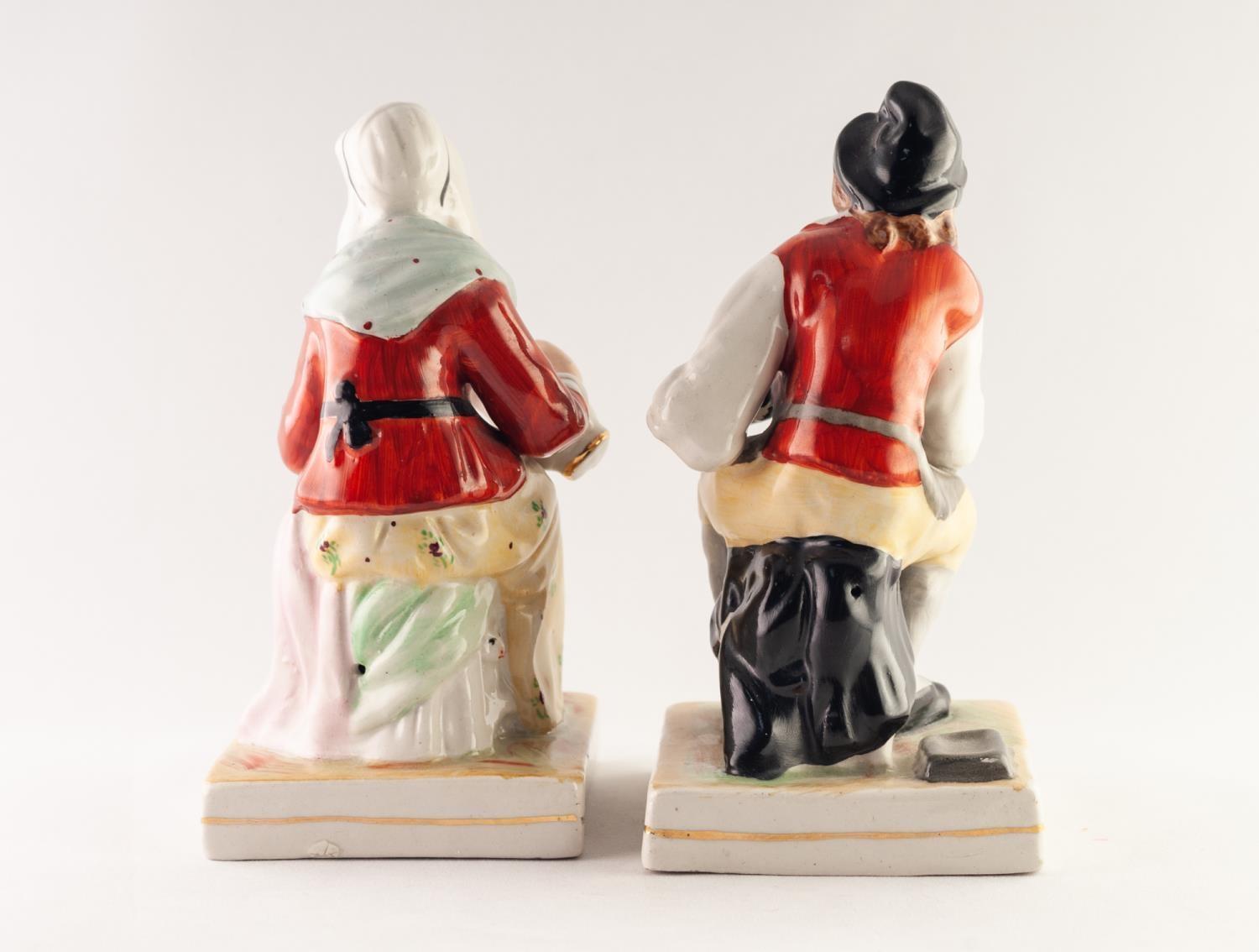PAIR OF NINETEENTH CENTURY STYLE REPRODUCTION POTTERY FIGURES OF A COBBLER AND HIS WIFE, each - Image 2 of 2