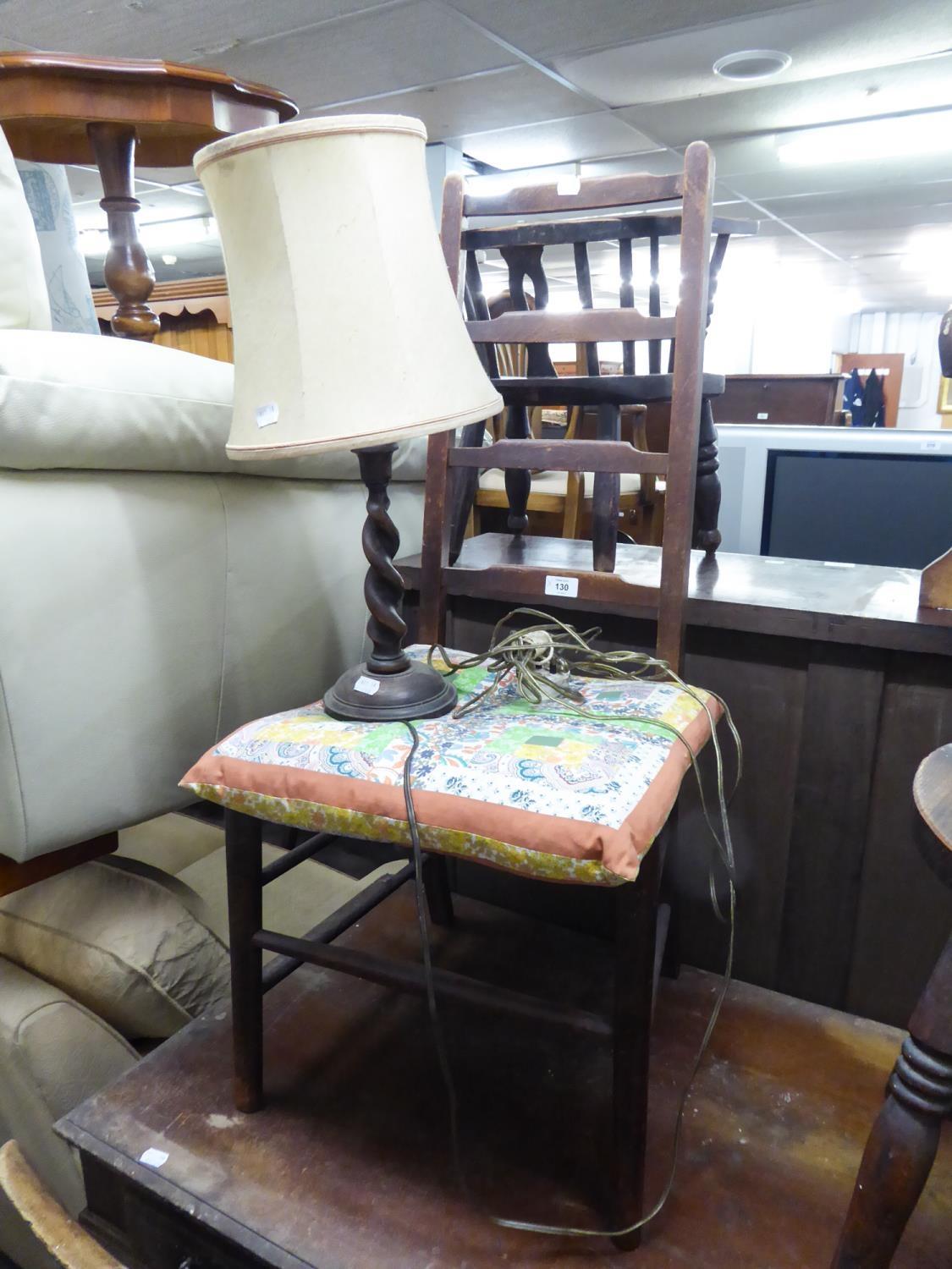 A HARDWOOD SINGLE CHAIR WITH LADDER BACK, STRING SEAT AND AN OAK SPIRAL TABLE LAMP