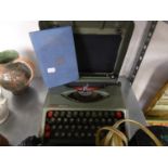 EMPIRE ARISTOCRAFT PORTABLE MANUAL TYPEWRITER AND A PITMANS DICTIONARY