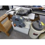 A 'WHITE' OF AXMINISTER ELECTRIC PLANER THICKNESSER WITH ATTACHMENT FOR A DUST EXTRACTOR, ON STAND