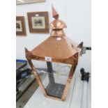 A COPPER FRAMED LARGE LANTERN, ADAPTED FOR WALL MOUNTING