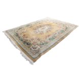 EMBOSSED CHINESE CARPET of Aubusson design with floral centre medallion and spandrels on an off-