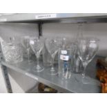 A CUT GLASS BISCUIT BARREL, A CUT GLASS DECANTER AND STOPPER, CUT GLASS DRINKING GLASSES AND OTHER