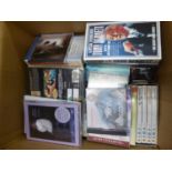 A QUANTITY OF CD's AND DVD's