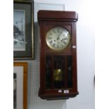 CIRCA 1940's MAHOGANY CASED WELLINGTON TYPE WALL CLOCK, WITH SPRING DRIVEN MOVEMENT STRIKING AND