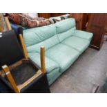A MINT GREEN LEATHER THREE PIECE SUITE, COMPRISING A THREE SEATED SOFA AND TWO CHAIRS (3)