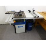 A SCHEPPACK ELECTRIC BENCH SAW, WITH SLIDING PLATFORM AND DUST EXTRACTOR