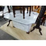 A GREY VEINED MARBLE SQUARE COFFEE TABLE WITH CANTED CORNERS WITH MARBLE BLOCK BASE