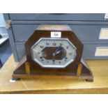 OAK CASED ART DECO MANTLE CLOCK, with silvered dial and Westminster chime
