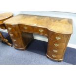 GOOD QUALITY EARLY TWENTIETH CENTURY QUEEN ANNE STYLE FIGURED WALNUT TWIN PEDESTAL DESK, the