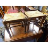 PAIR OF GEORGIAN COUNTRY STYLE RUSH SEATED OAK STOOLS, each of oblong form with turned, tapering