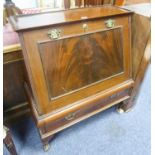 EARLY TWENTIETH CENTURY GEORGIAN STYLE FIGURED MAHOGANY COCKTAIL CABINET, the flame cut fall front