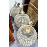 SET OF THREE MODERN THREE LIGHT GLOBE SHAPED CEILING LIGHTS, each with rows of prism cut square
