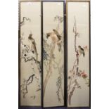 SET OF THREE ORIENTAL NEEDLEWORK PICTURES ON SILK, birds perched on flowering branches, unsigned,