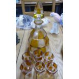 ART DECO STYLE CLEAR AND AMBER FLASHED OCTAGONAL SHAPED GLASS DECANTER AND SIX SMALL TOTS (7)