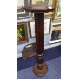 VICTORIAN AND LATER MAHOGANY TORCHERE, the octagonal, moulded top inset with faux green leather,