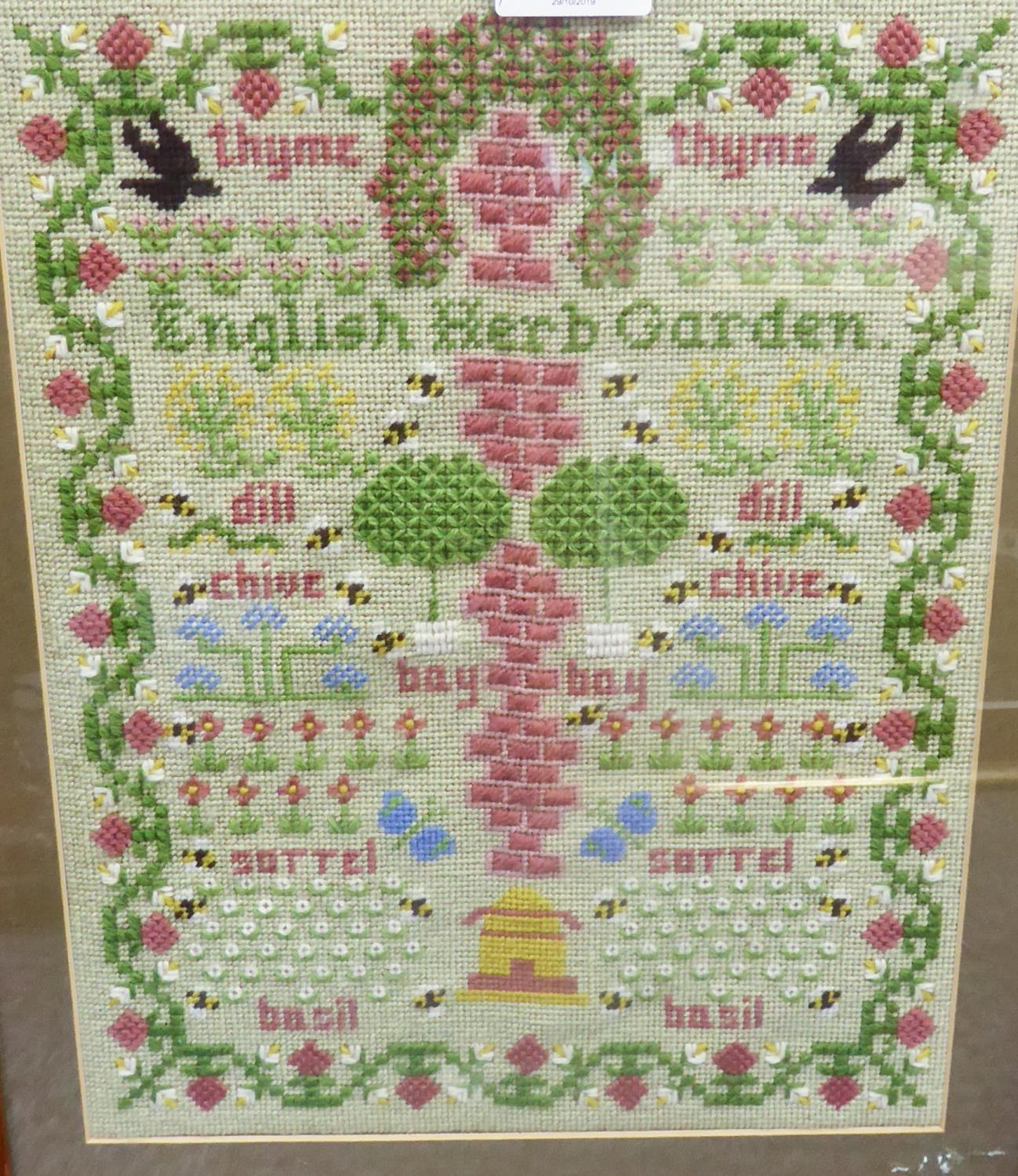 UNATTRIBUTED, CHILD'S NEEDLEWORK SAMPLER, 'English Herb Garden',worked in colours with plants,bees - Image 2 of 2