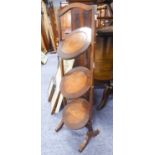 EARLY TWENTIETH CENTURY THREE TIER OAK FOLDING CAKE STAND, with circular dished, tier and square