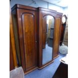 VICTORIAN FIGURED MAHOGANY THREE DOOR BREAK FRONT WARDROBE OF SMALL PROPORTIONS, the short,