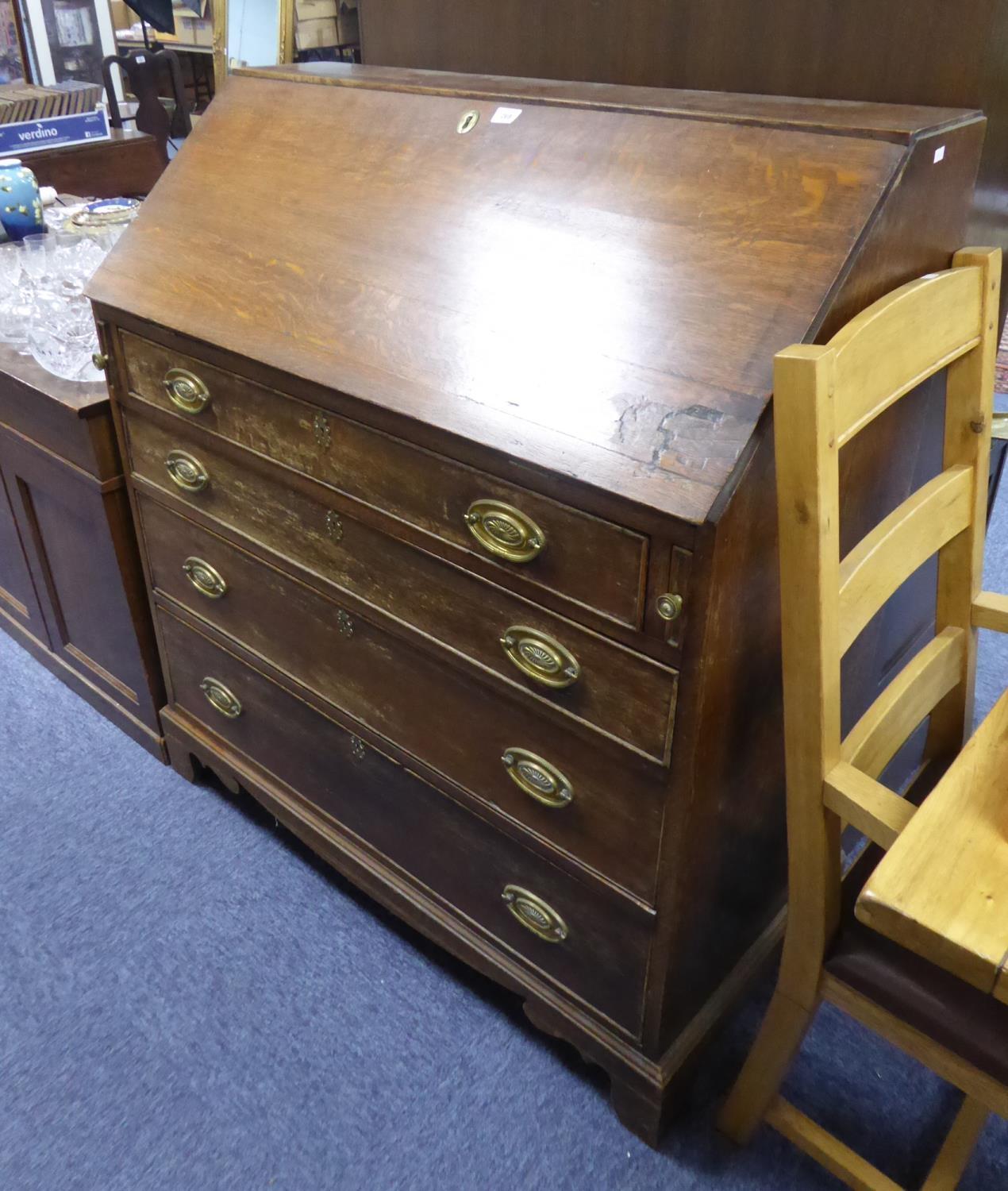 GEORGE III OAK LARGE BUREAU, of typical form, the pine interior fitted with pigeon holes, set