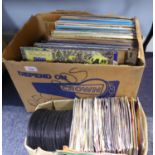 QUANTITY OF VINYL RECORDS, ALBUMS AND SINGLES, A MIXED GENRE COLLECTION; classical, pop, folk,