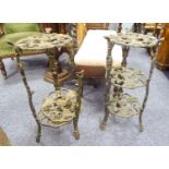 PAIR OF MODERN CAST AND PIERCED METAL THREE TIER CIRCULAR STANDS, each tier moulded with roses,