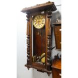 EARLY TWENTIETH CENTURY FIGURED WALNUT CASED VIENNA WALL CLOCK, the 8" two part Roman dial with