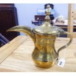 MIDDLE EASTERN CHASED BRASS COFFEE POT, of baluster form with high domed, hinged lid with finial