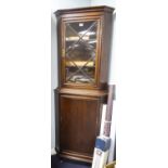 1940's OAK DOUBLE CORNER CUPBOARD, the upper section with astragal glazed door and two shelves to