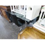 A MODERN GLASS TOP DINING TABLE ON CHROME BASE AND A SET OF FOUR CHROME AND LEATHER CHAIRS (5)