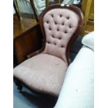 A VICTORIAN SPOON BACK NURSING CHAIR, COVERED IN PINK BUTTON BACK FABRIC