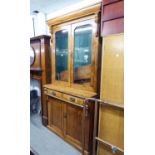 A VICTORIAN LIGHT OAK AND FRUITWOOD TWO PIECE BOOKCASE, THE UPPER SECTION HAVING TWO GLAZED DOORS,