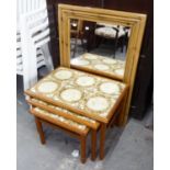 A PINE FRAMED WALL MIRROR AND A NEST OF 3 COFFEE TABLES WITH TILED TOP