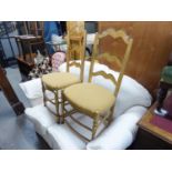 A SET OF FOUR LIGHTWOOD DINING CHAIRS (4)