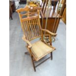 A STEAMER CHAIR, WITH SLATTED BACK