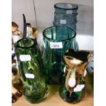 A HEAVY BLUE GLASS VASE (A.F.) AND THREE GREEN GLASS VASES, ONE WITH GILT AND FLORAL DECORATION (4)