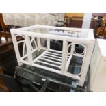 A WHITE PAINTED BAMBOO OBLONG COFFEE TABLE WITH GLASS TOP