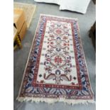 TWO EASTERN STYLE RUGS