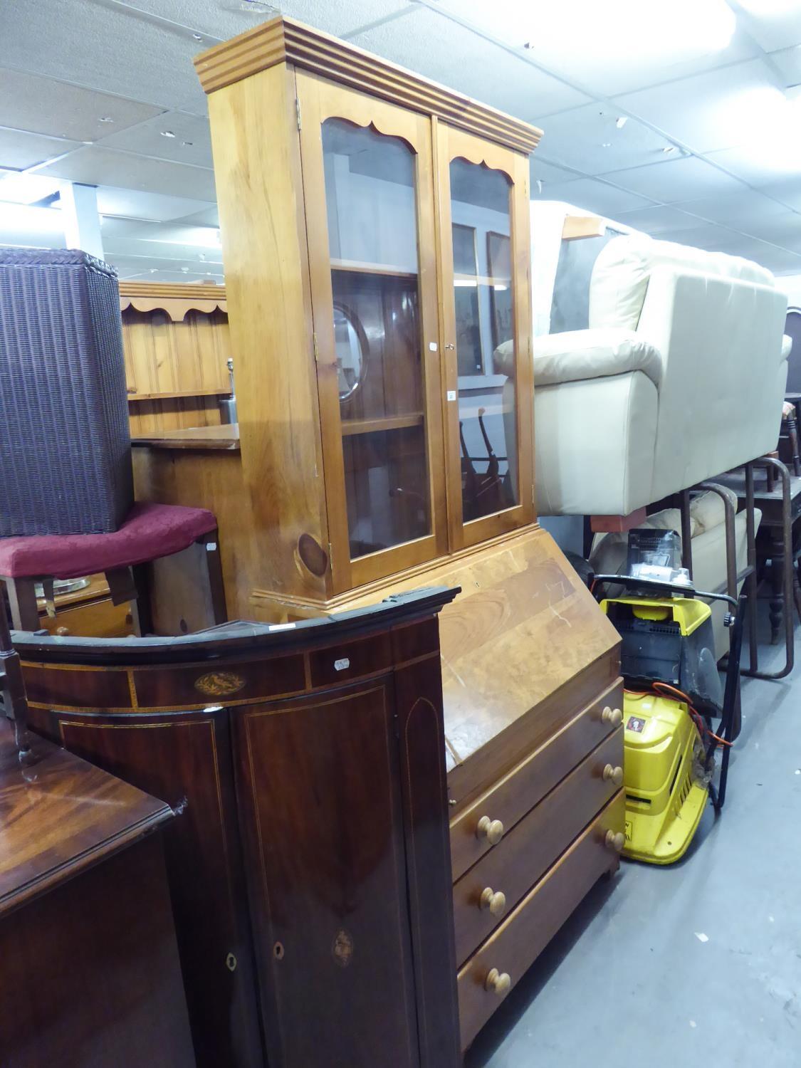 A PINE BUREAU BOOKCASE, THE UPPER SECTION HAVING TWO GLAZED DOORS, THE BASE HAIVNG FALL-FRONT OVER