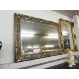 A LARGE BEVELLEDGE OBLONG WALL MIRROR IN SILVERED FINISH FRAME