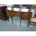 A GEORGIAN MAHOGANY BOW FRONTED SMALL SIDEBOARD, WITH CENTRAL DRAWER, FLANKED BY TWO CUPBOARDS AS