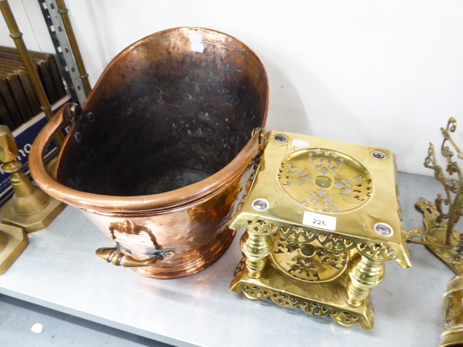 A BEATEN COPPER COAL SCUTTLE, AND A SQUARE BRASS TRIVET (2)