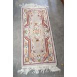 A CHINESE HEARTH RUG