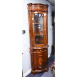 AN ITALIAN INLAID DOUBLE CORNER CUPBOARD, THE TOP SECTION HAVING A GLAZED DOOR AND A SMALL SIMILAR