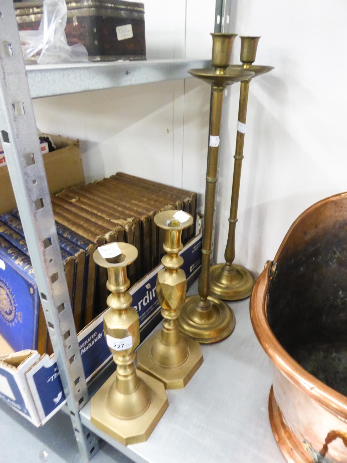 PAIR OF TALL ARTS AND CRAFTS STYLE BRASS CANDLESTICKS, WITH EXTENDED BALUSTER AND KNOP STEMS,