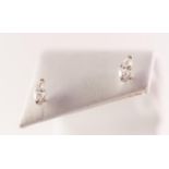 A pair of marquise cut diamond stud earrings, estimated total diamond weight 0.50ct, probably I-J