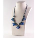 A VINTAGE NORMAN HARTNELL METAL AND TWO-TONE BLUE PASTE SET NECKLACE