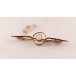 9ct GOLD BAR BROOCH, the circlet pattern centre collet set with a cabochon circular opal and a 9ct